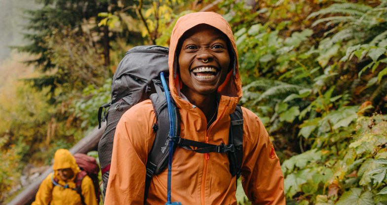 A woman hiking with a backpack